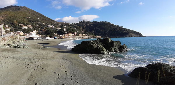 Scenic view of beach against sky