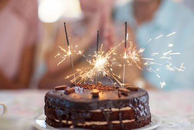 Chocolate birthday cake with sprklers