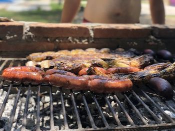 Close-up of meat on barbecue grill