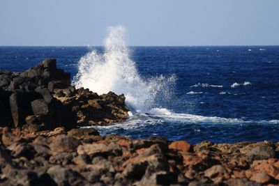 Scenic view of sea against clear sky