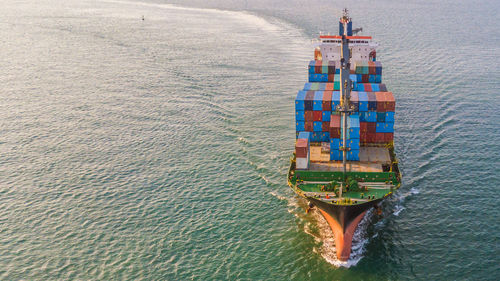 High angle view of boat sailing in sea