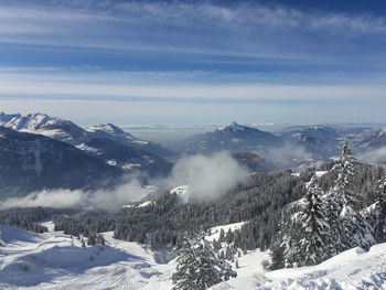 Snow covered mountains against sky