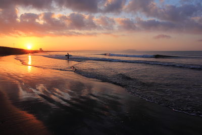 Scenic view of sea at sunset