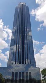 Low angle view of modern buildings against sky