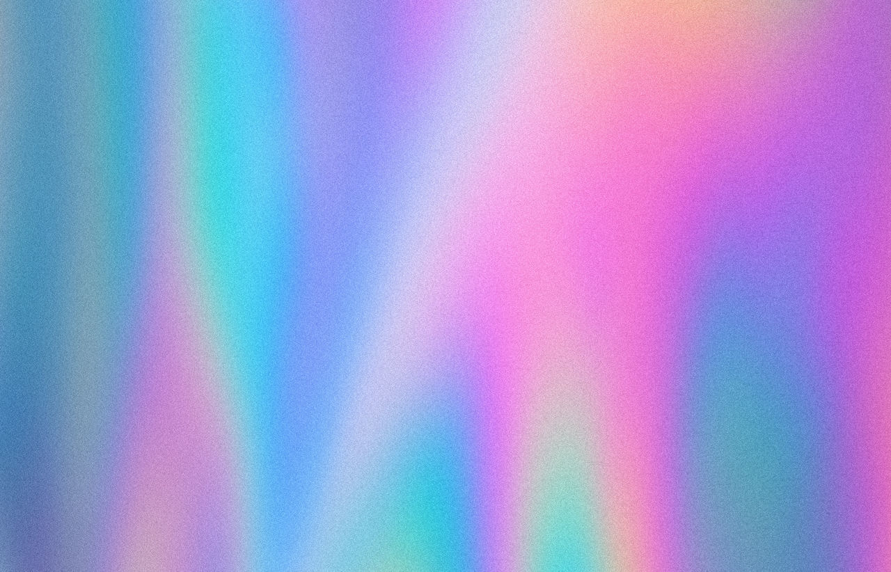 DEFOCUSED IMAGE OF MULTI COLORED WALL