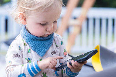 Cute girl using mobile phone