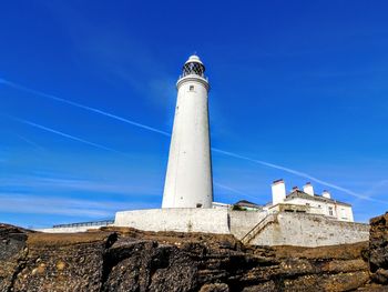 Low angle view of lighthouse against sky