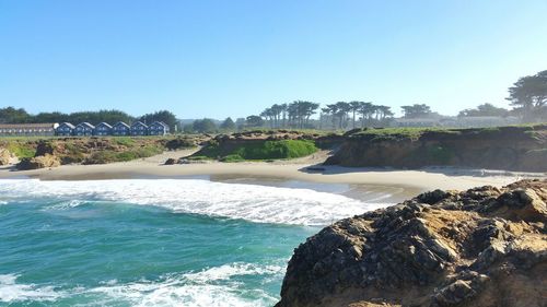 Scenic view of sea against blue sky