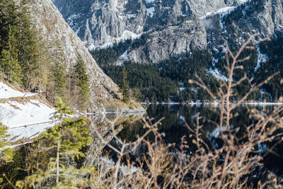 Scenic view of lake and mountains during winter