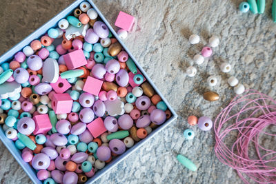 High angle view of multi colored candies on table