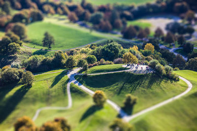 Tilt-shift image of golf course on field