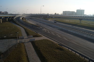 Roads in city against clear sky