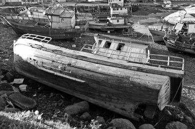 Boats moored on abandoned boat