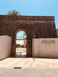 Entrance of historic building against sky