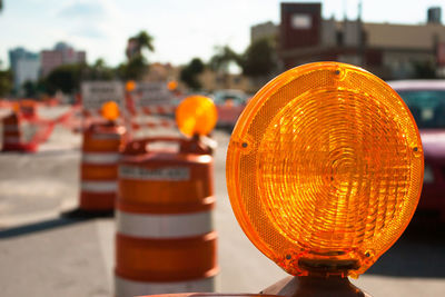 Close-up of road reflector on street