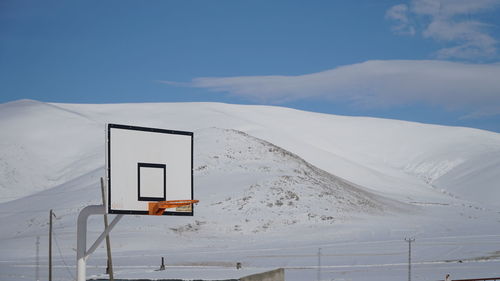 Snow covered mountain against sky