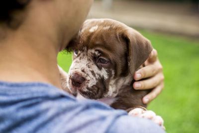 Midsection of woman with dog