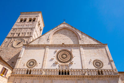 Low angle view of building against blue sky