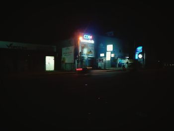 Illuminated sign at night