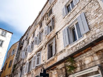 Low angle view of residential building against sky