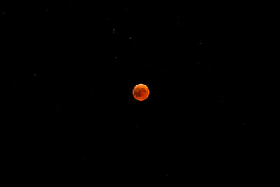 Idyllic shot of full moon against clear sky at night