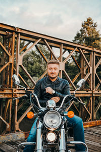 Portrait of smiling man riding