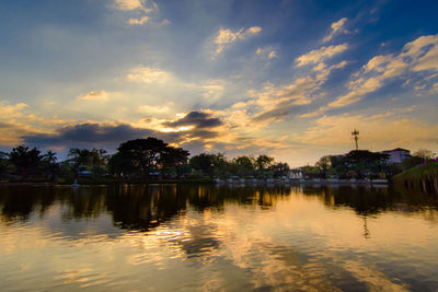 Scenic view of lake against sky during sunset