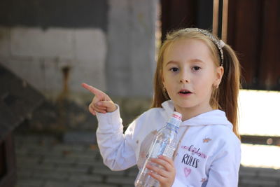 Portrait of cute girl looking away