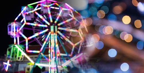 Defocused image of illuminated lights at night