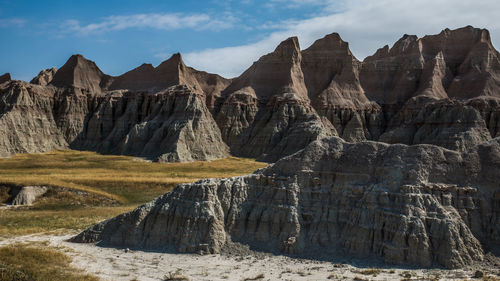 Panoramic view of rocky mountains against sky