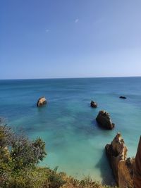 Scenic view of sea against clear sky