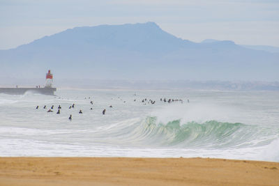 Scenic view of beach against sky