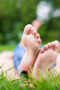 Low section of person lying at park