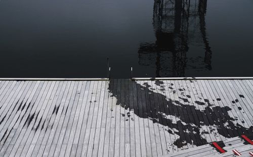 High angle view of reflection in lake during winter