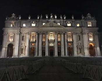 Facade of historic building at night