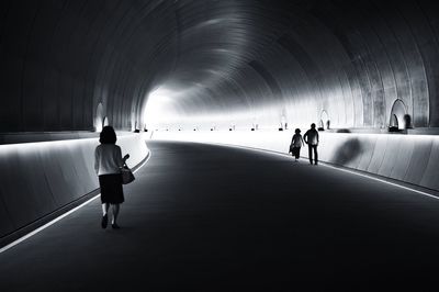 Full length of woman in tunnel