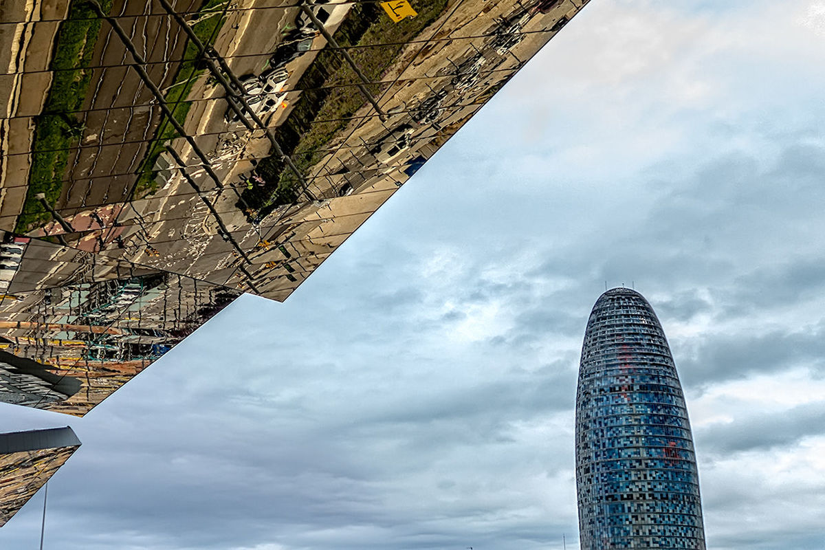 low angle view, architecture, built structure, building exterior, sky, tall - high, modern, skyscraper, tower, city, office building, cloud - sky, cloudy, building, outdoors, cloud, day, glass - material, directly below, tall