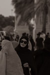 Portrait of people standing on mask