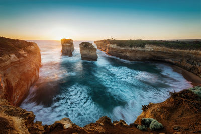 Scenic view of sea against sky during sunset