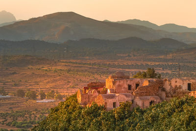 High angle view of townscape against mountain