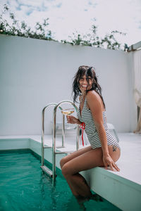 Portrait of woman in swimming pool