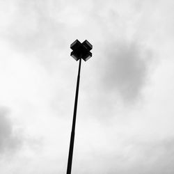 Low angle view of street light against sky