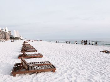 Panoramic view of sea and city against sky