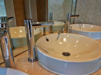 Close-up of faucet in bathroom