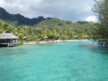 Scenic view of sea against cloudy sky