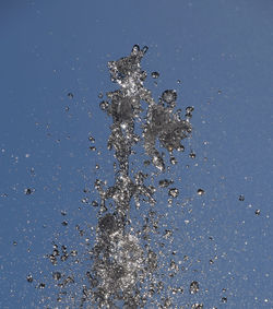 Close-up of water drops on table