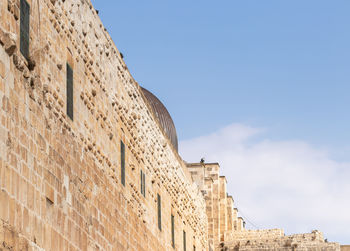 Low angle view of historical building against sky