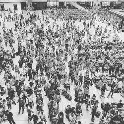 High angle view of people walking on road