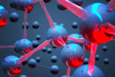 Close-up of molecular structure against blue background
