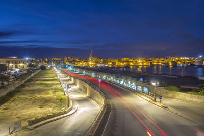 Light trails on road at night